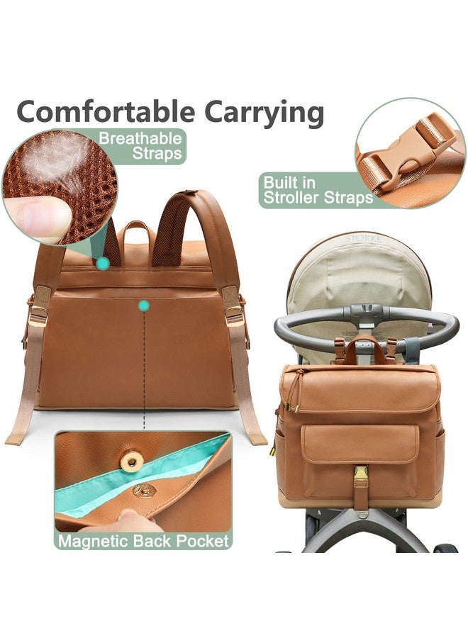 MOMINSIDE حقيبة ظهر حفاضات MOMINSIDE، 12 جيب حقيبة حفاضات جلدية صغيرة، حقيبة أطفال، بحث عن سجل الأطفال، 4 جيوب معزولة، وسادة تغيير، أحزمة عربة (بني) - Image 5