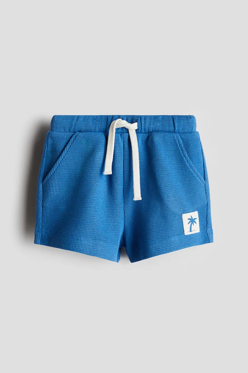 اتش اند ام Waffled cotton shorts