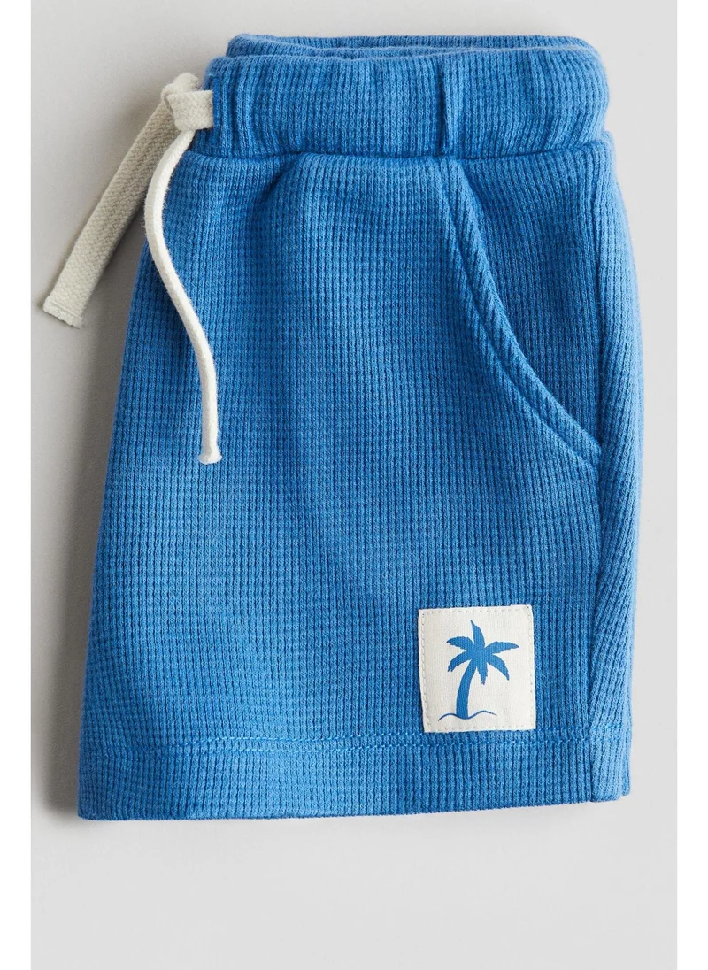 اتش اند ام Waffled cotton shorts