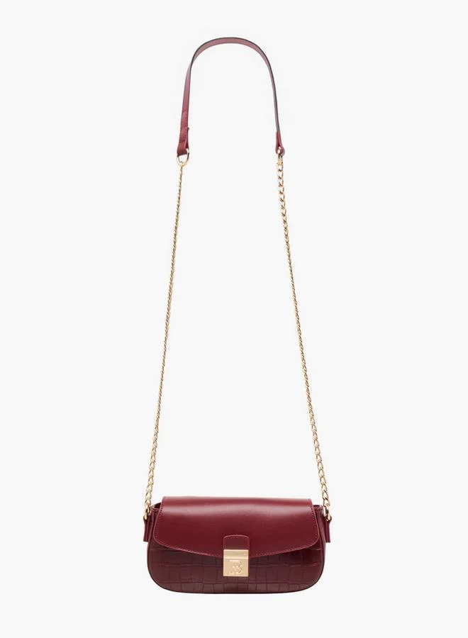 فلورا بيلا من شو إكسبرس حقيبة كروس بودي بنقوش مع حزام سلسلة