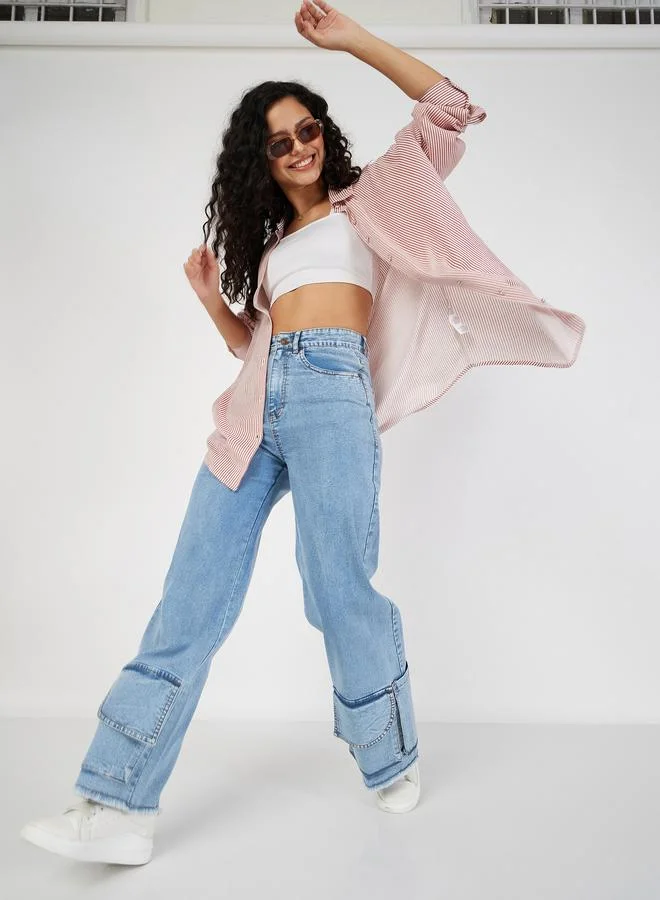 ساسافراس بلوزة واسعة بتفاصيل محزوزة