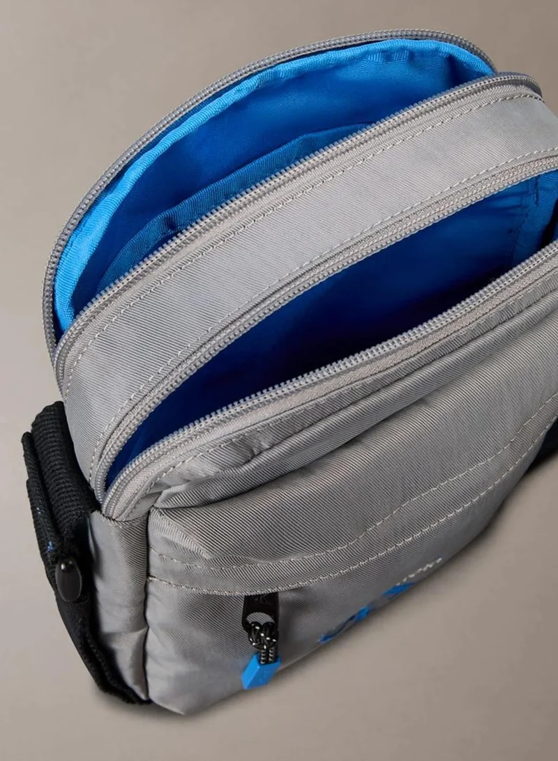 Calvin Klein Cloudburst Monologo Reporter Bag for Men | Best Price UAE