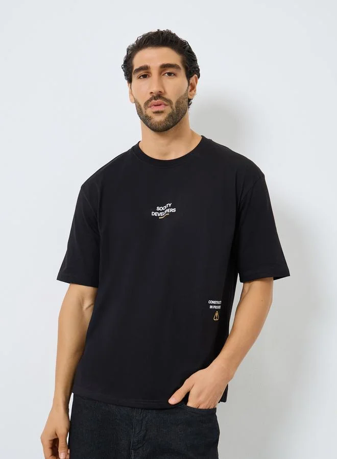 Styli Men Black Slogan Print Oversized T-Shirt