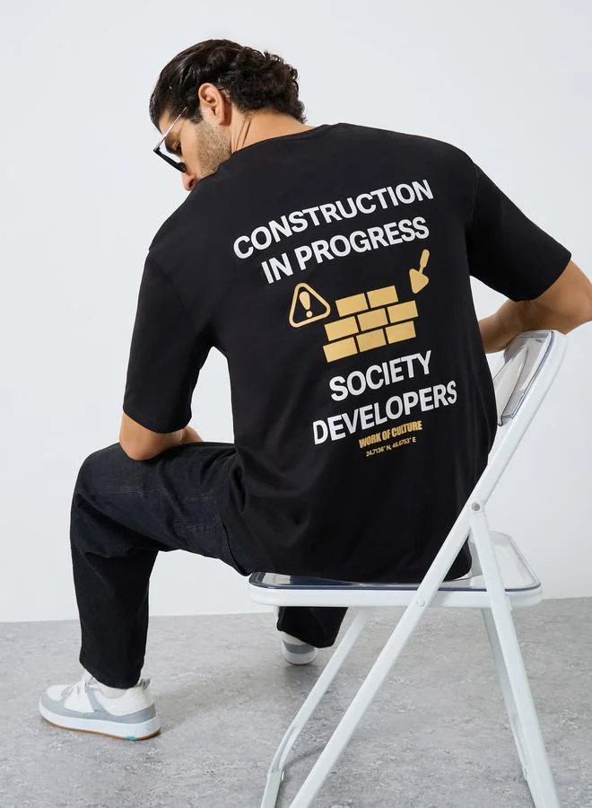 Styli Men Black Slogan Print Oversized T-Shirt
