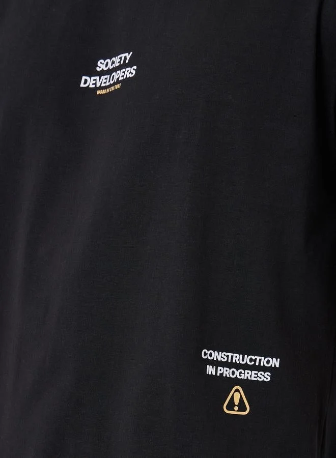 Styli Men Black Slogan Print Oversized T-Shirt