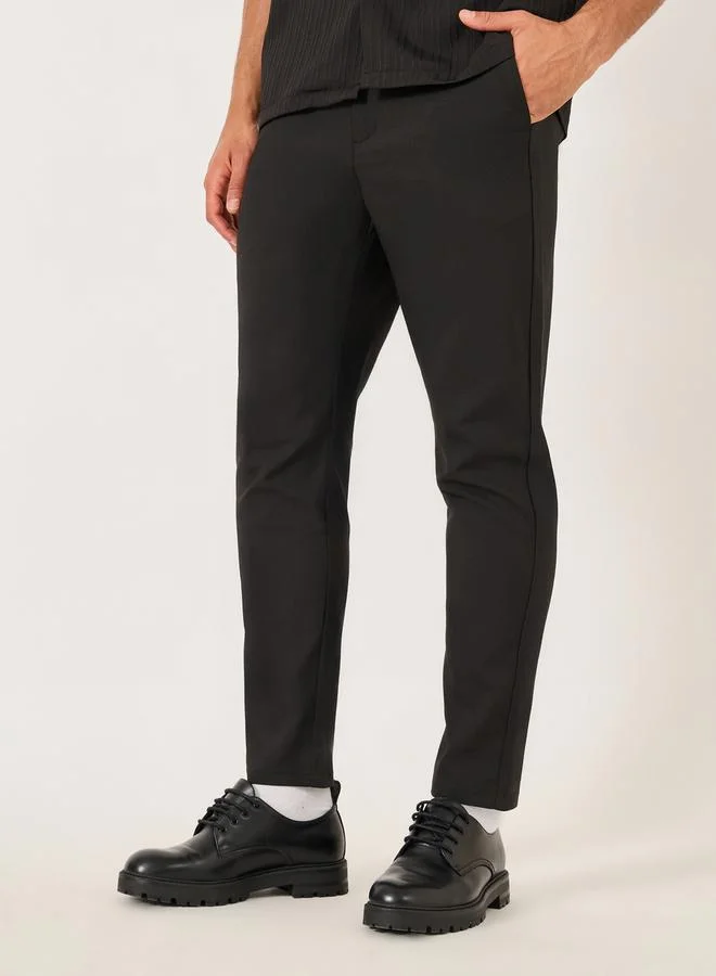 Take Two Solid Slant Pocket Tapered Pants by Styli