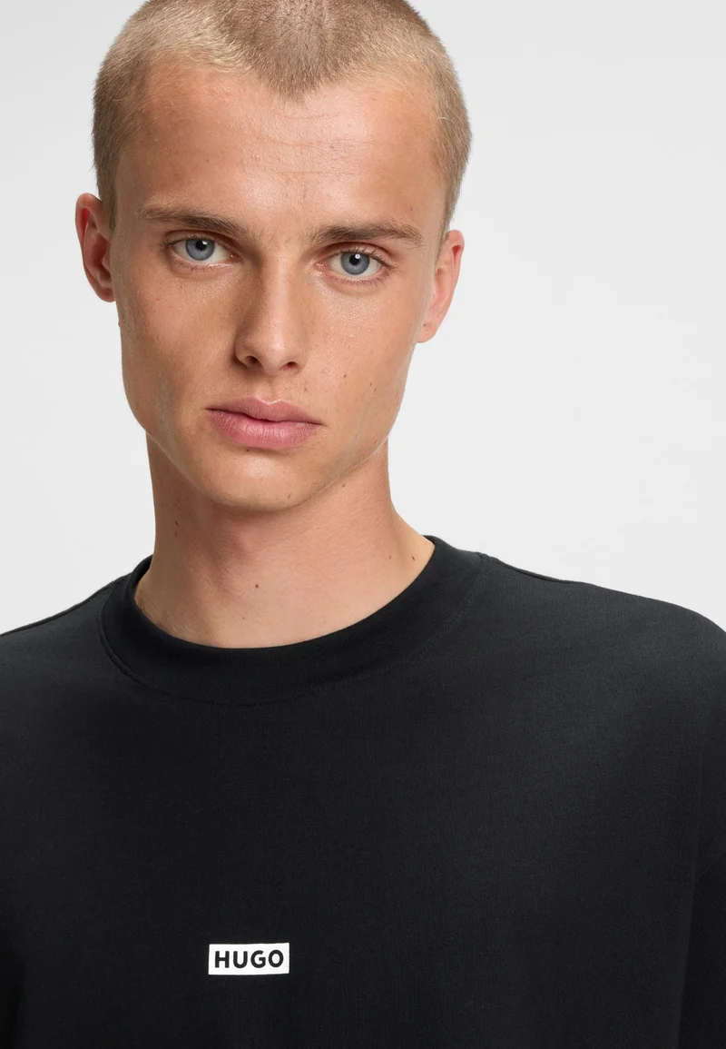 HUGO Black Loose-fit T-shirt in cotton with rear logo artwork for Men | Best Price UAE