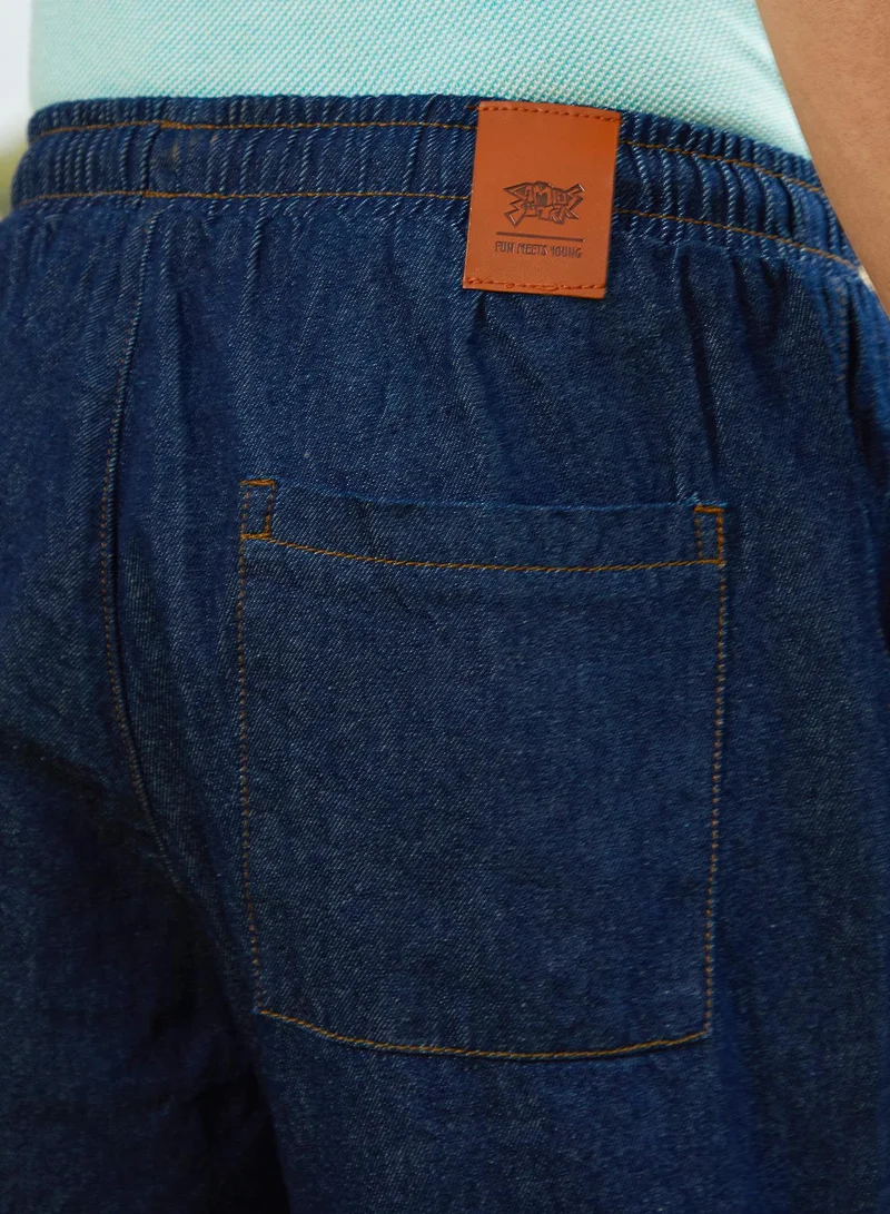 Campus Sutra Men's Indigo Blue Pleated Denim Jeans