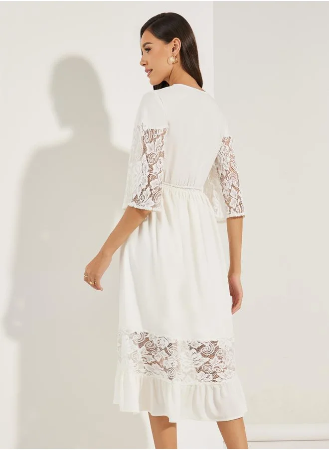ستايلي Lace Insert Midi Dress with Tassel Tie Waist