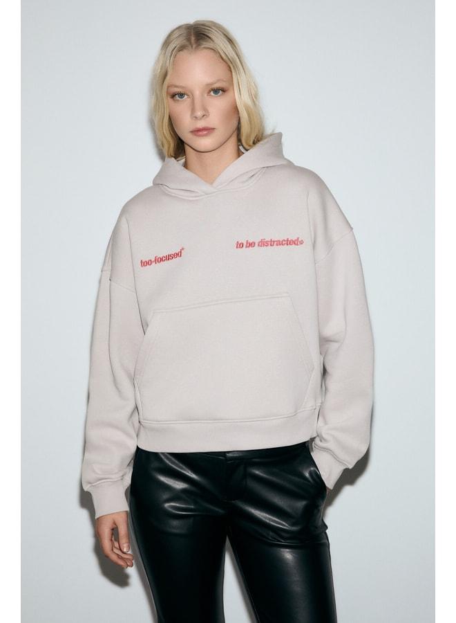 GRIMELANGE SILENT Women's Hooded Organic Cotton Sweatshirt with Polyester Lining, Kangaroo Pocket, Printed and Embroidered, Light Lilac. - Image 1