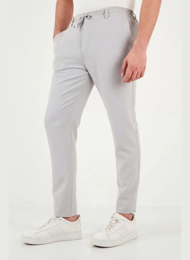 Buratti  Buratti Slim Fit Regular Waist Tapered Leg Trousers Men's Pants 6843660 for Men | Best Price UAE