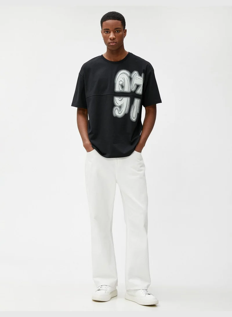 كوتون Varsity Oversized T-Shirt Graffiti Printed Crew Neck Seam Detailed