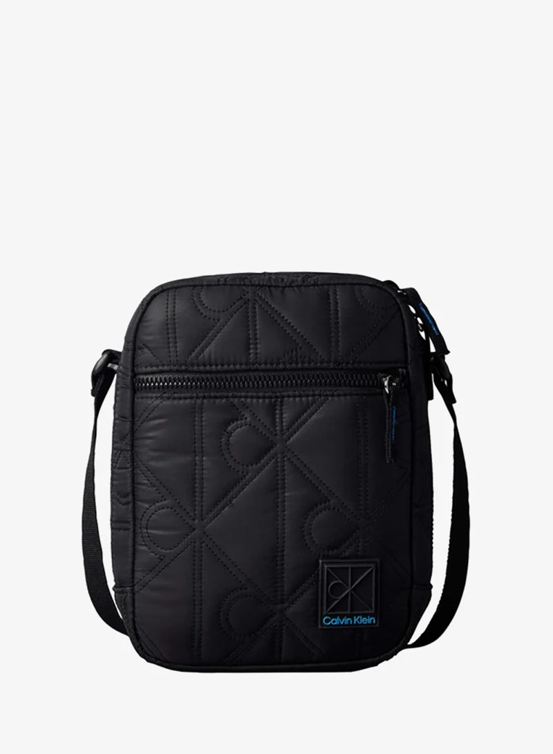 Emblem Quilted Crossbody Reporter Bag