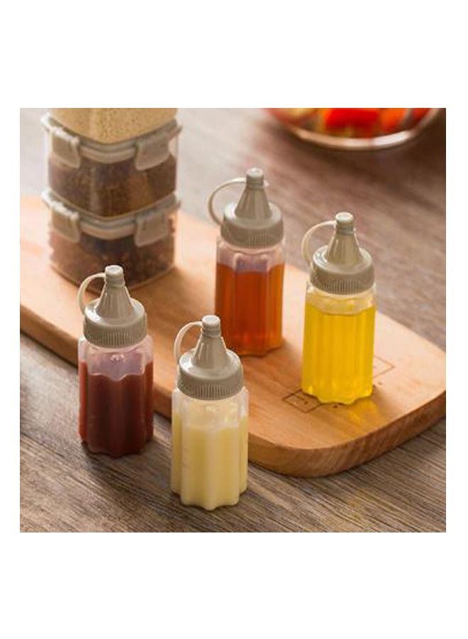 Meetion 4 قطع من زجاجات الصلصة البلاستيكية الصغيرة وعلب التوابل وعلب صلصة السلطة المحمولة للاستخدام الخارجي وعلبة التوابل للشواء وأداة المطبخ - Image 1