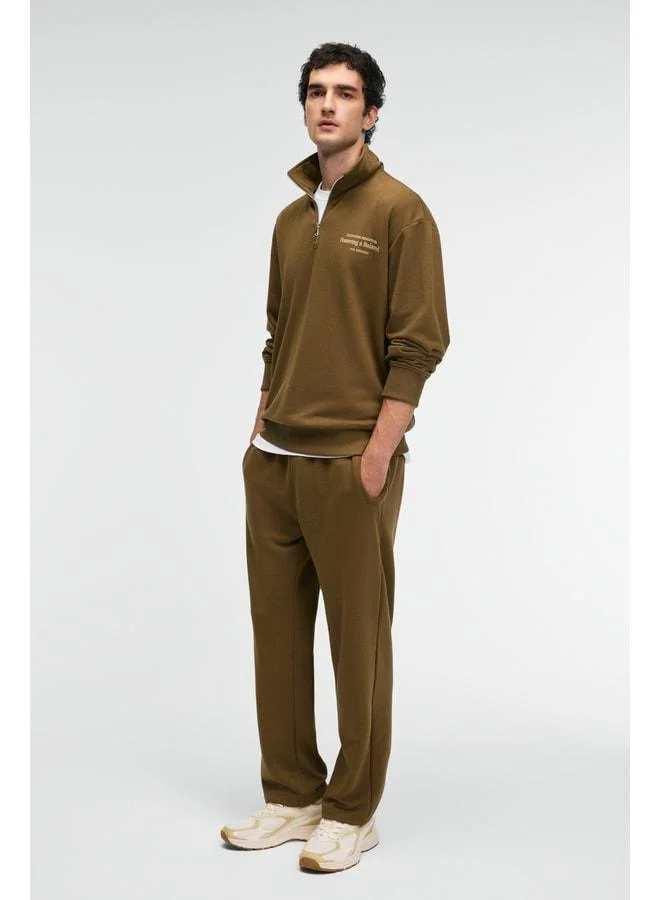 GRIMELANGE CLARENCE Men's 100% Cotton Cord Elastic Waist Back Pocket Decorative Label Khaki Sweatpants.