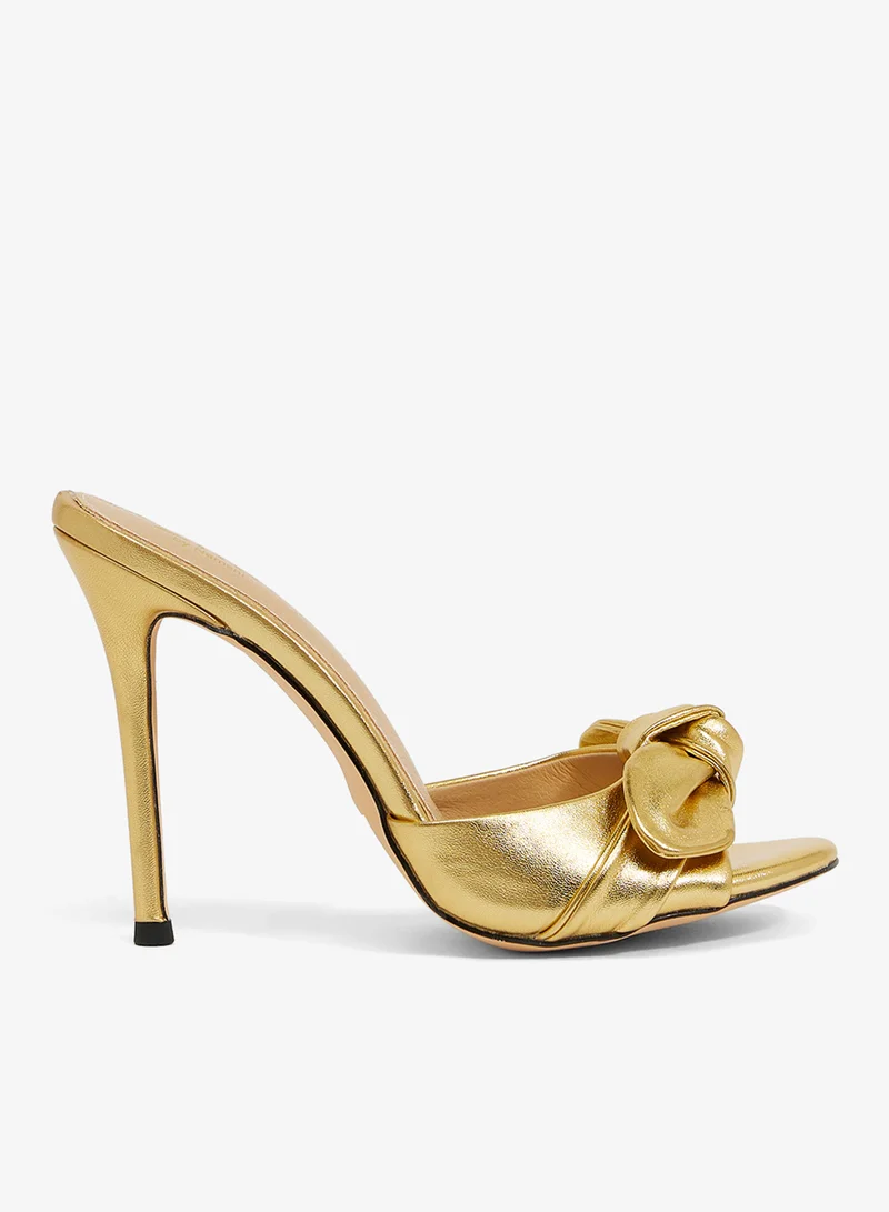 Gold metallic open-toe mule with bow detail, stiletto heel (Dolce & Gabbana)