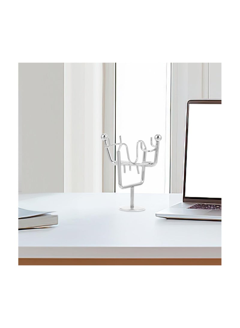 "Enjoy an experience of balance and calm with the Newton's Cradle - elegant design, smooth movement, and a clever decorative touch that adds a sophisticated scientific touch to your office or home. "