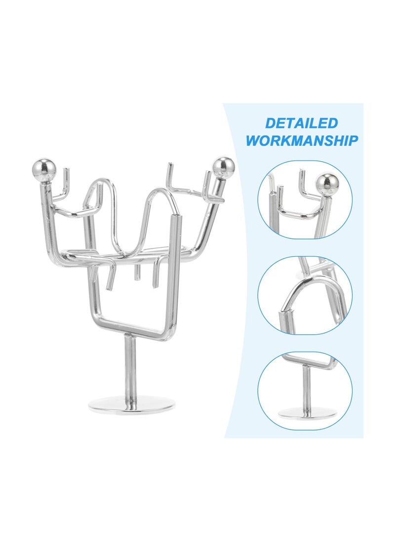 "Enjoy an experience of balance and calm with the Newton's Cradle - elegant design, smooth movement, and a clever decorative touch that adds a sophisticated scientific touch to your office or home. "