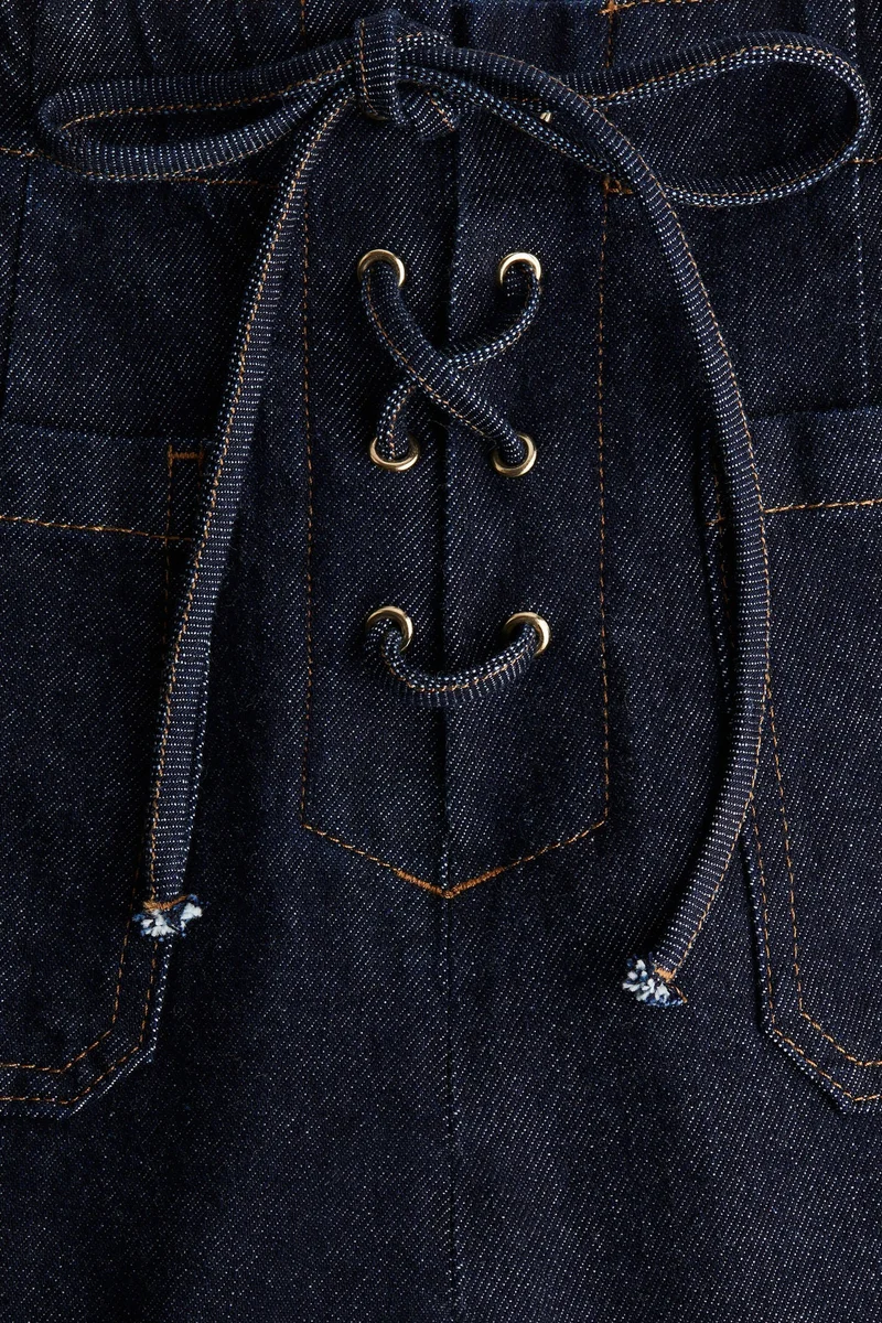 اتش اند ام جينز بحافة سفلية واسعة وخصر عالي