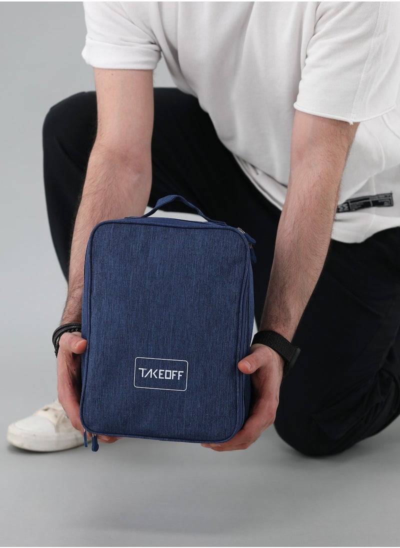 TAKEOFF - travel bag is your ultimate travel companion, equipped with a variety of tools to ensure a comfortable and enjoyable journey. Whether you want to watch a movie on your phone or tablet, or get some sleep, this bag has everything you need, including a device holder, neck pillow, blanket, travel bidet, slippers, eye mask, and earplugs. - Image 1