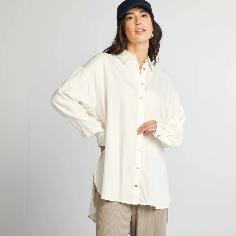 Flowing Blouse With Longer Back Beige