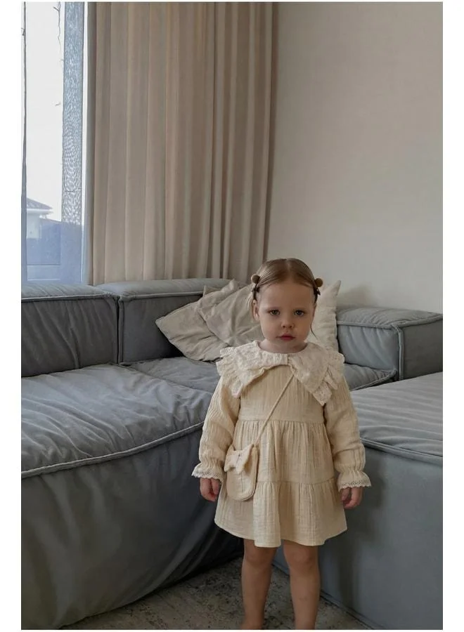 Magu Baby Girl Beige Cotton Eyelet Lace Collar Dress – Long Sleeves, Tiered Design.