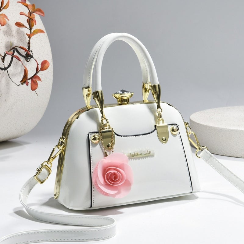 Steel armor mini shell bag, suitable for casual fashion, shiny surface, equipped with floral charm pendant, multi-functional handbag or cross-body bag, fashionable classic, lightweight and durable design - Image 3
