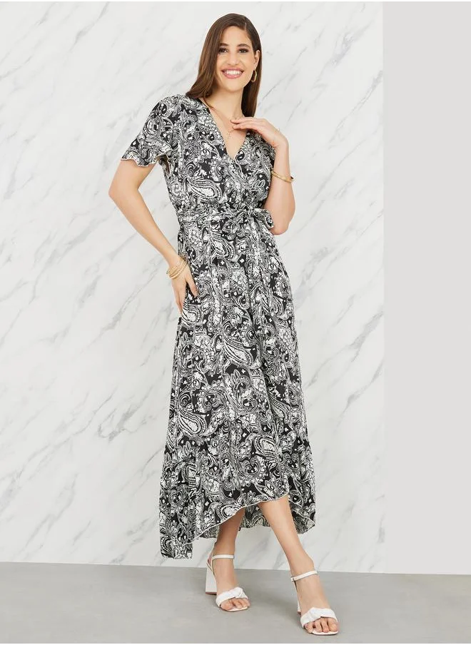 Styli Paisley Print Asymmetric Hem A-Line Midi Dress with Self Tie Up