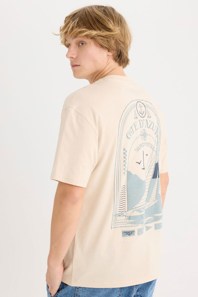 ديفاكتو تيشيرت أوفر سايز نص كم بياقة مستديرة بطبعة من الخلف - Image 1