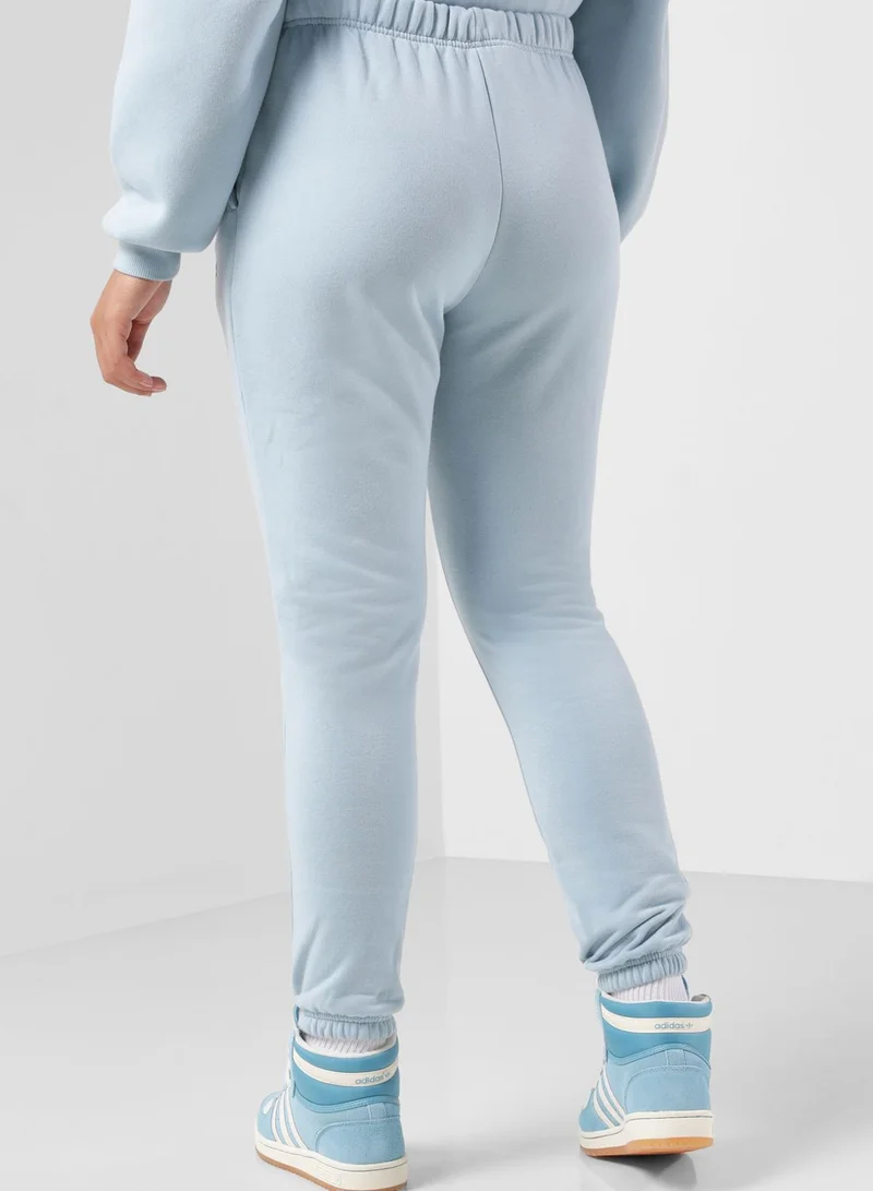 The Giving Movement Fitted Logo Joggers