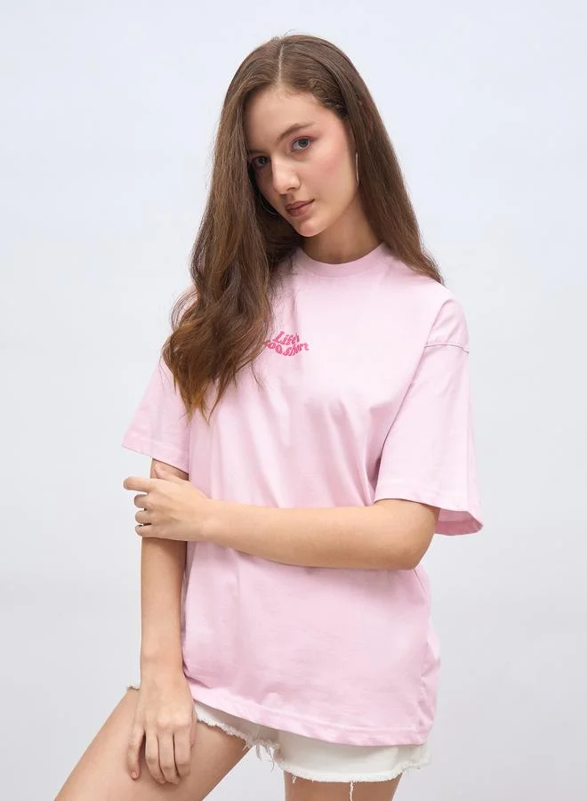 Styli Pink Styli Slogan Print Short Sleeve Oversized T-Shirt for Women | Best Price UAE