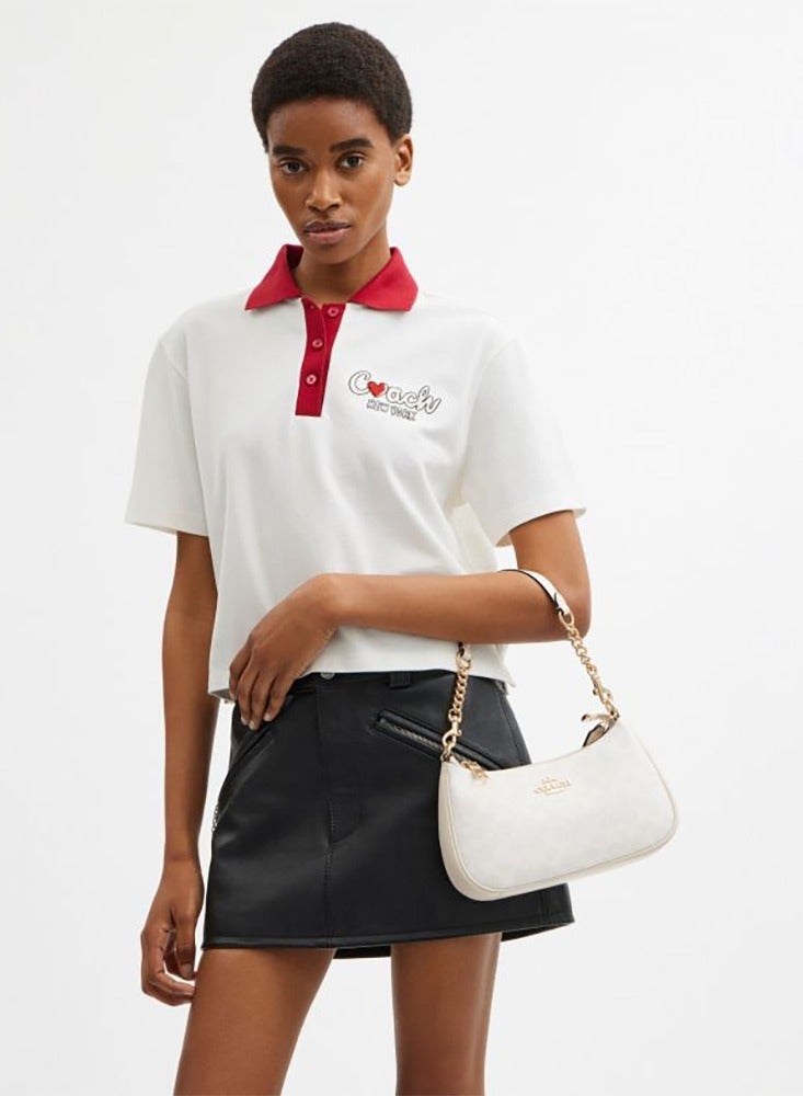 كوتش اوت ليت حقيبة كتف TERI ذات شعار كلاسيكي للمدرب، حقيبة كروس بودي، حقيبة يد - Image 4