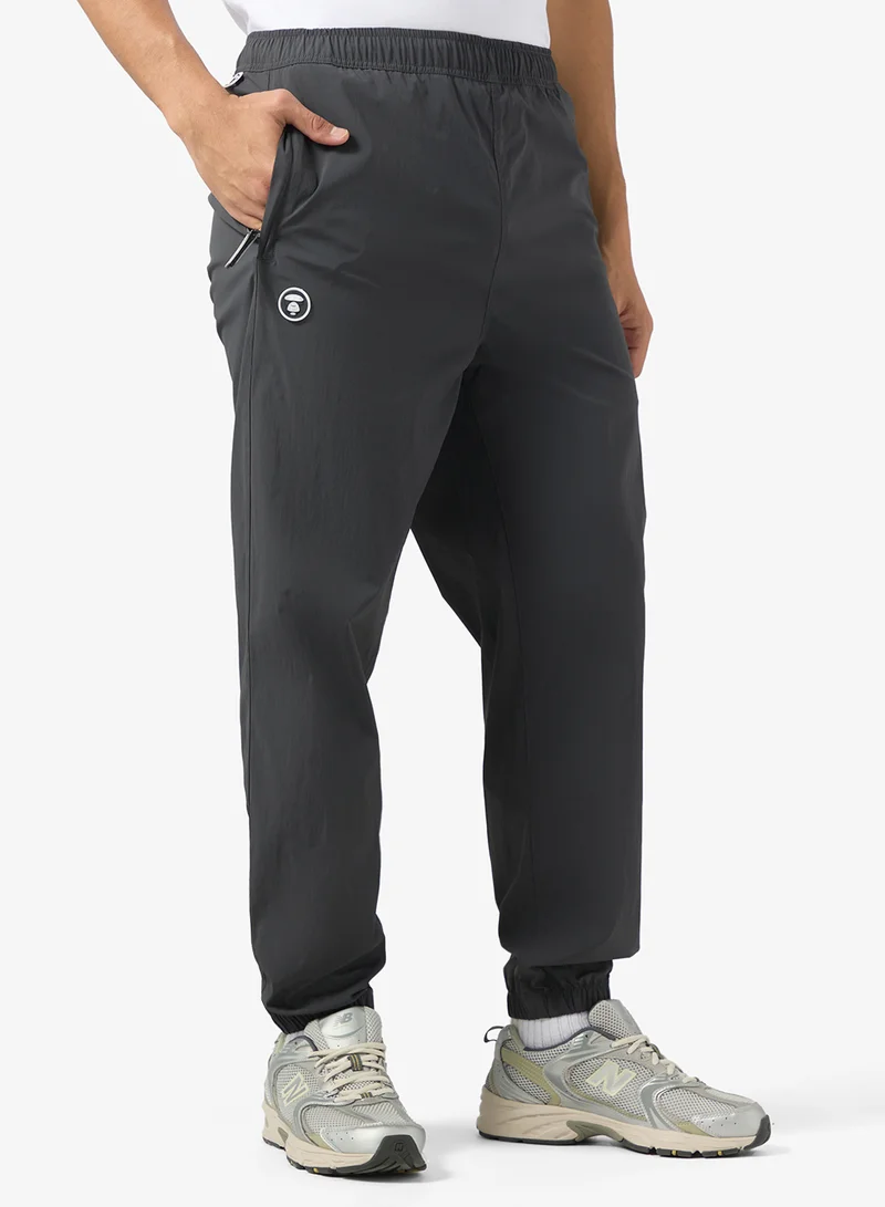 AAPE AAPENOW moonface logo jogger pants