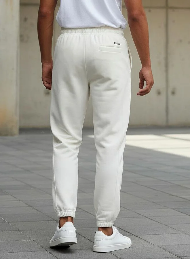 Kappa  Kappa Men Drawstring Waist Joggers for Men | Best Price UAE