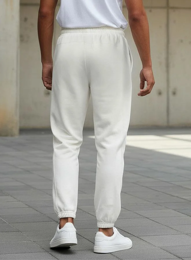 Kappa WHITE Kappa Men Drawstring Waist Joggers for Men | Best Price UAE