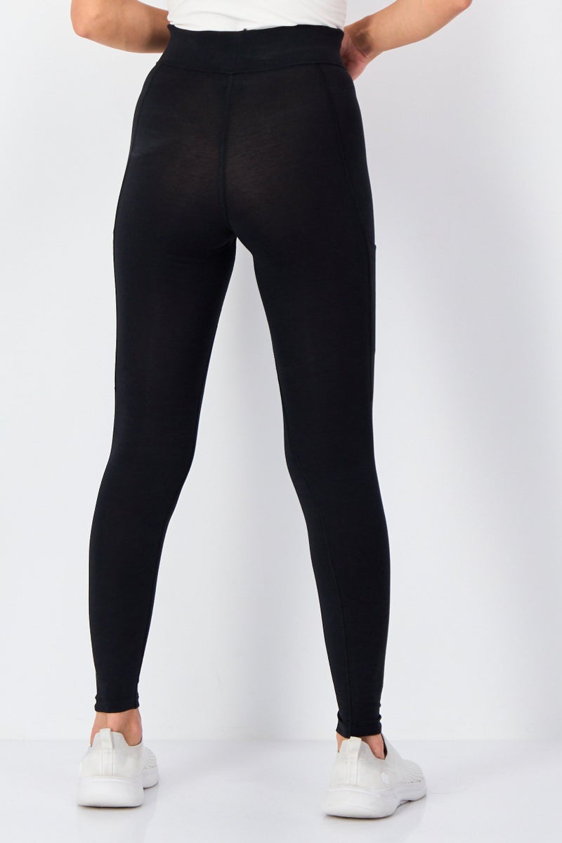 Nike ليجنغ تدريب ضيق للنساء بشعار العلامة التجارية، أسود - Image 2