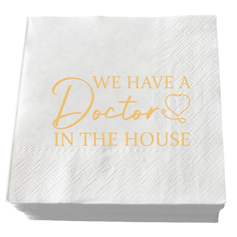 SWEETTALA We Have A Doctor In The House Napkins  50 Pack White and Gold Doctor Graduation Cocktail Napkins  Class of 2025 Medical School Graduation Party Supplies Decorations  3 Ply - Image 1