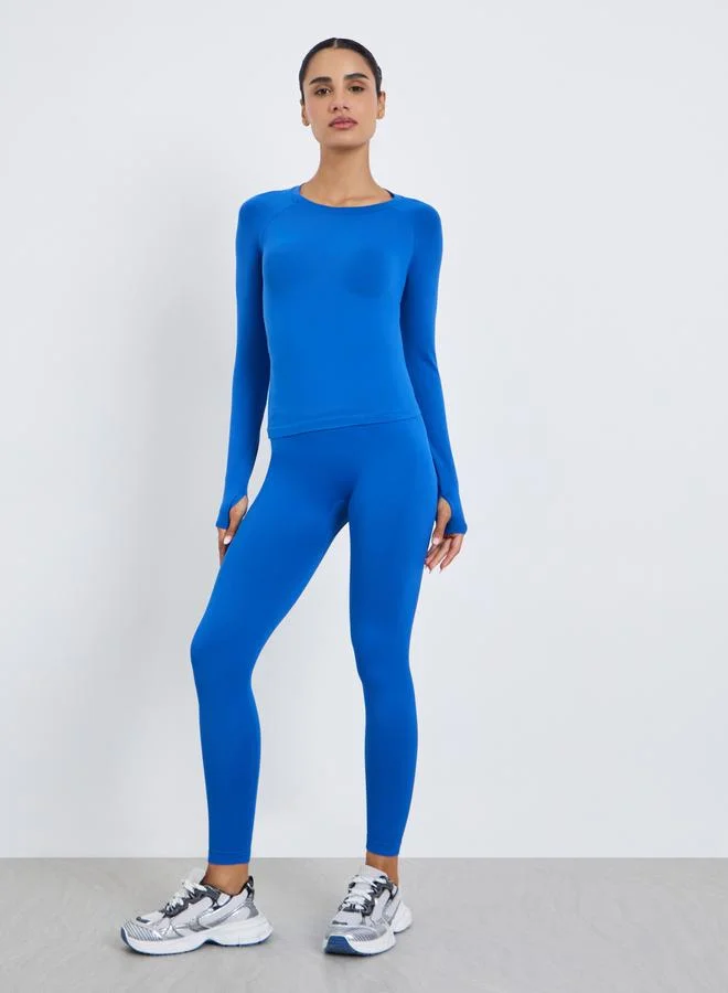 ستايلي اكتيف مجموعة من ليقنز وبلوزة بفتحة إبهام ودرزات