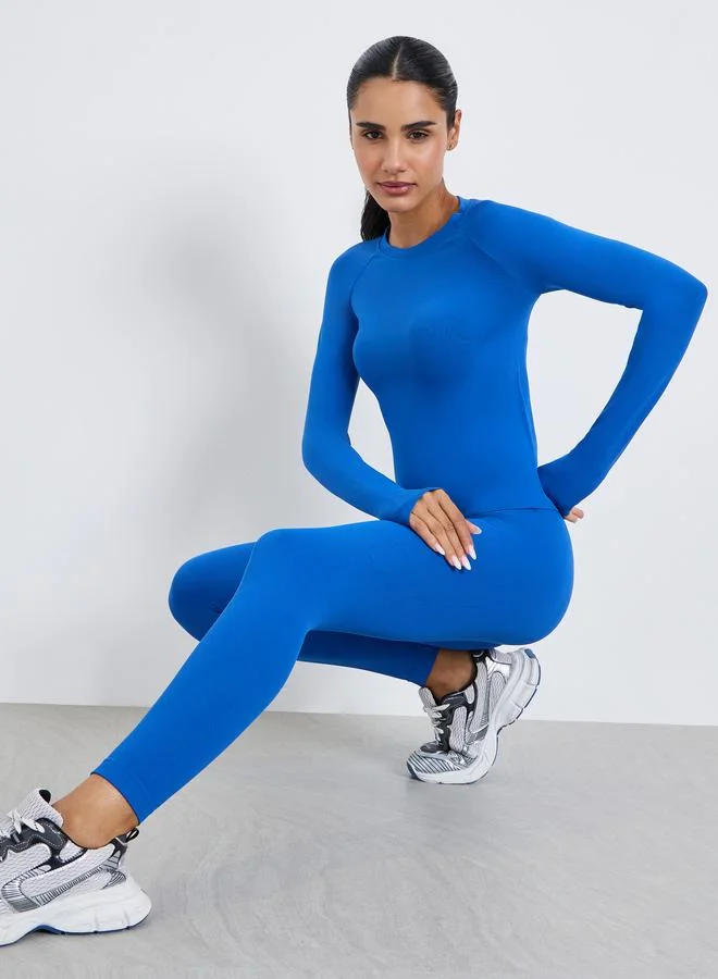 ستايلي اكتيف مجموعة من ليقنز وبلوزة بفتحة إبهام ودرزات