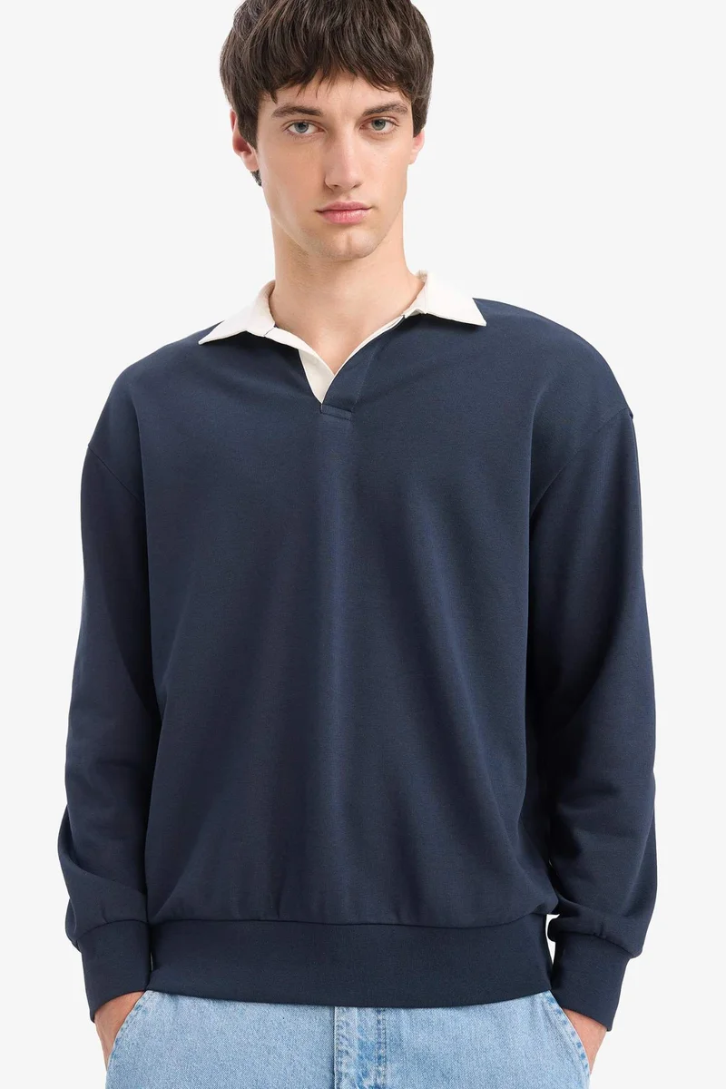 ديفاكتو Boxy Fit Long Sleeve Sweatshirt
