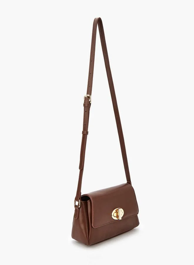 فلورا بيلا من شو إكسبرس حقيبة كروس بودي صلبة بحزام قابل للتعديل وقفل ملتوي