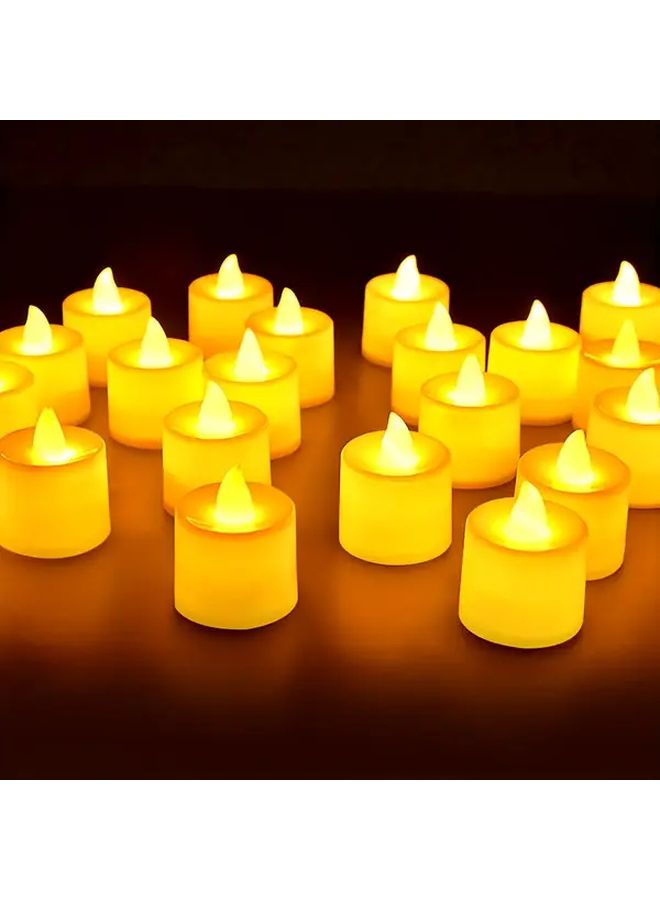 بطاريات شموع LED تعمل بالبطارية 12 قطعة ضوء أصفر لديكور الزفاف والعطلات - Image 1