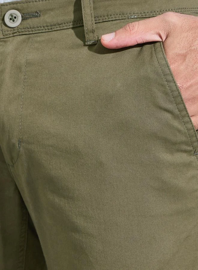 Styli  Olive Solid Regular Fit Chino Trousers for Men | Best Price UAE