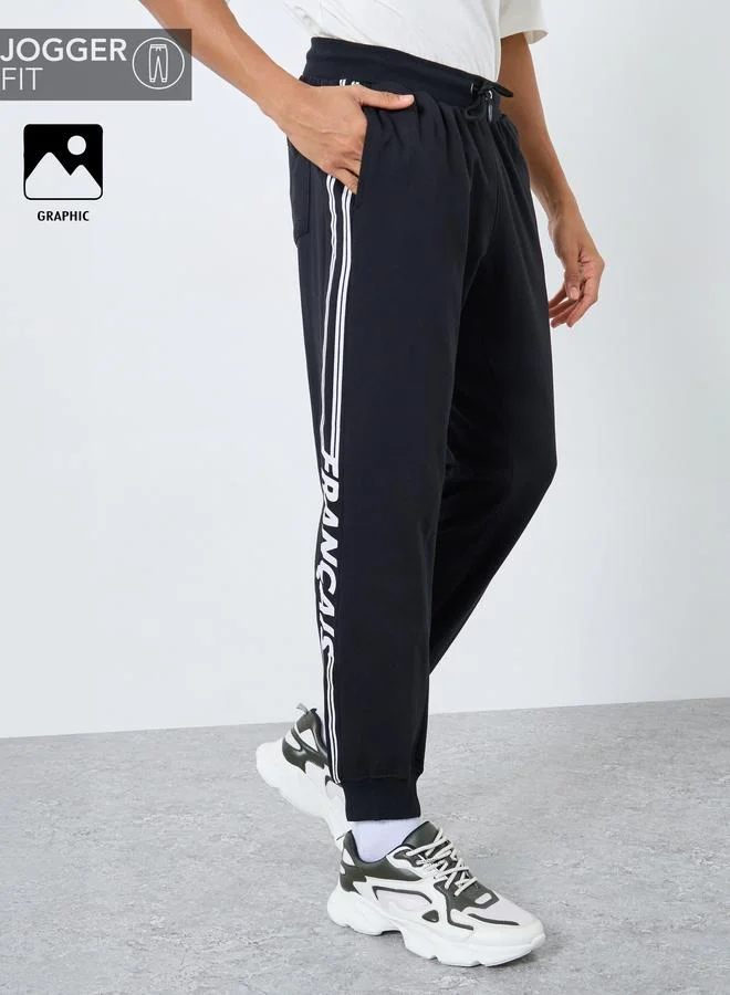 Styli Men Black Slogan Print Joggers