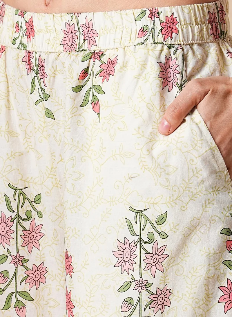 جلو باص طقم كورتا بالازو نسائي بطبعات زهور من جلوبس