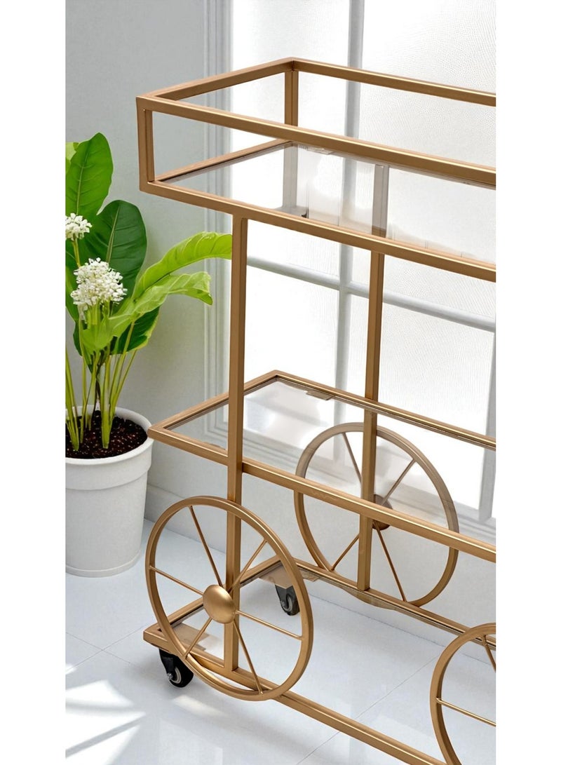 fan baytk Three-tiered gold serving cart with shatter-resistant clear glass - luxurious cycle design, 90 x 35 x 85 cm, a mobile elegance that suits your private and public occasions.  - Image 3