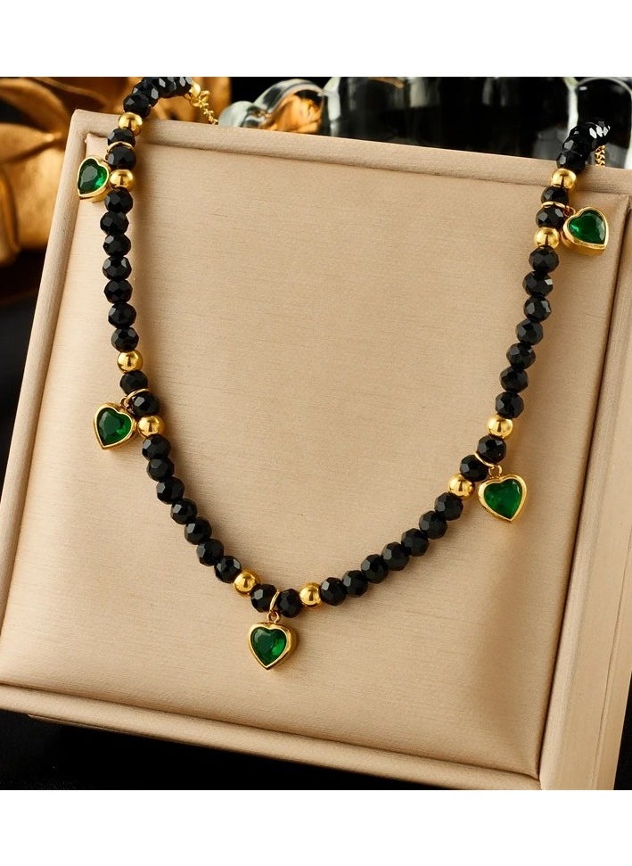 The Black Pearl Accessories - Stainless Steel Necklace Golden with Black Crystal Beads and Green Zircon hearts Pendants - Image 1