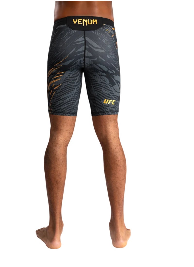 VENUM - UFC FUSION BY VENUM AUTHENTIC FIGHT NIGHT VALE TUDO SHORTS BLACK/GOLD - Image 1