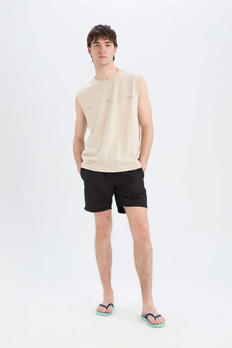 Defacto  Regular Fit Mesh Lined Lightweight Fabric Swim Shorts for Men | Best Price UAE