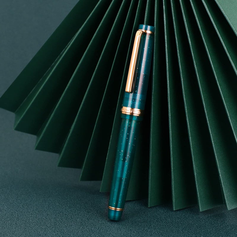Wikult Jinhao 82 Acrylic Fountain Pen, Iridium Fine Nib with Ink Converter, Transparent Peacock Blue Fluorescent Classic Design Smooth Writing Pen (Gold Trim) - Image 3